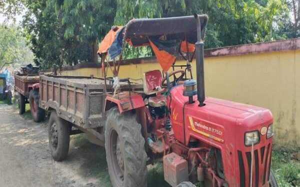 Tractor loaded with sand