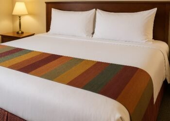 The secret behind the colourful strip on hotel beds! Know why this 'bed runner' is laid