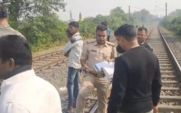 A woman's body was found on a railway track in Dhanbad, causing panic in the area - police are investigating.