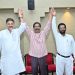 Chief Minister Hemant Soren raising the hands of INDIA Alliance candidates to show unity ahead of the Jharkhand Rajya Sabha Election 2026.
