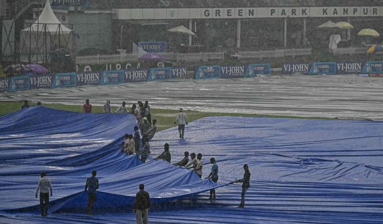 IND vs WI रांची T20 पर मंडराया संकट! क्या धुल जाएगा मुकाबला? जानें 9 अक्टूबर का वेदर अपडेट 1 JSCA International Stadium Complex ground covered with blue rain covers ahead of IND vs WI T20 match in Ranchi