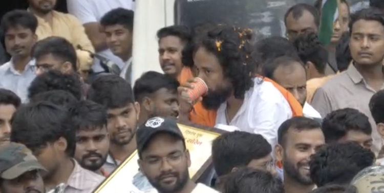 Student leader Devendra Nath Mahato on a stretcher during the JPSC-JSSC protest in Ranchi