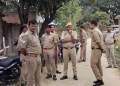 Prayagraj Police raid in Nawabganj Baripur village where three drums filled with crores of rupees were recovered buried underground.