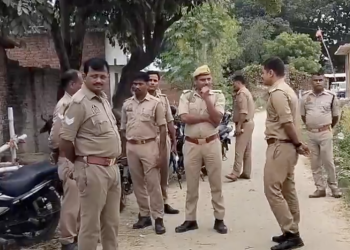 Prayagraj Police raid in Nawabganj Baripur village where three drums filled with crores of rupees were recovered buried underground.