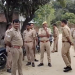 Prayagraj Police raid in Nawabganj Baripur village where three drums filled with crores of rupees were recovered buried underground.
