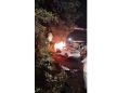 Horrific accident at a railway crossing in Katras; car catches fire after hitting the height gauge; occupants have a narrow escape.