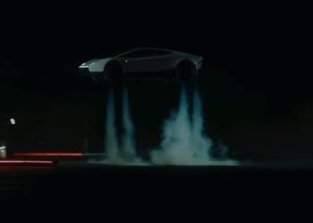 Tesla reveals a flying Roadster; the car flips in mid-air and lands safely.